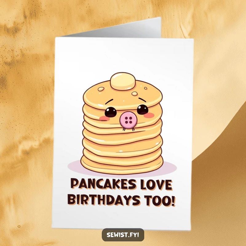 Funny Free Printable Birthday Card: Wobbly pancake stack humorously sewing a giant button onto itself, a quirky DIY gift.