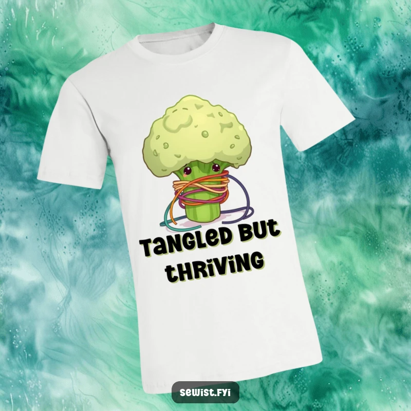 Funny t-shirt with a clumsy broccoli floret comically tangled in colorful sewing thread, ideal for humorous crafter apparel.